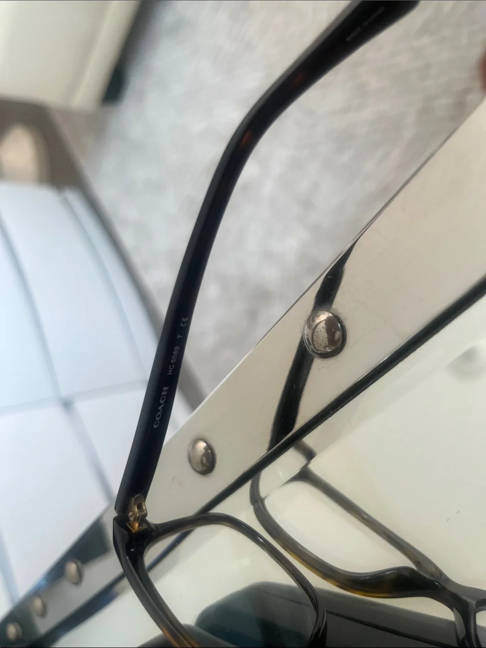 Coach Black Frame Sunglasses with Green Lenses